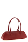 the magda butrym brigitte trapeze handbag defines a new geometry through an el