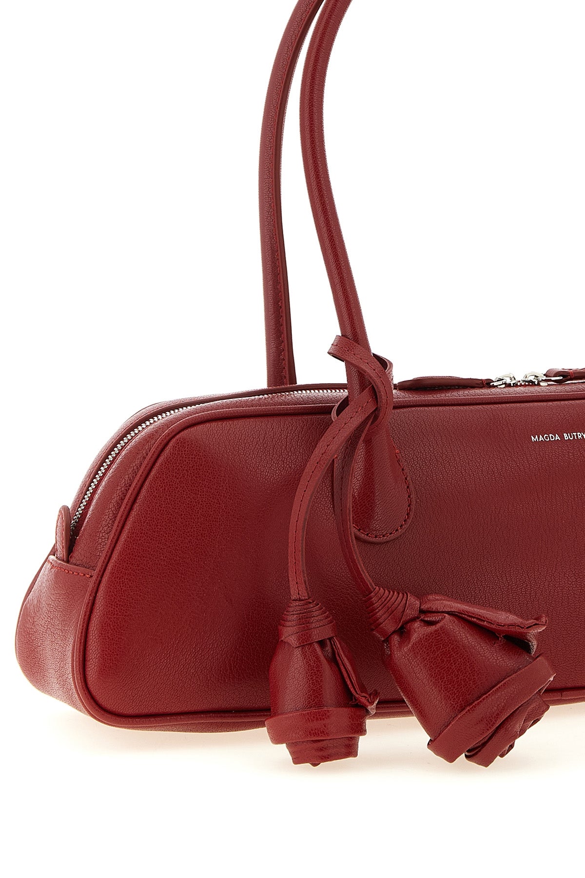 the magda butrym brigitte trapeze handbag defines a new geometry through an el