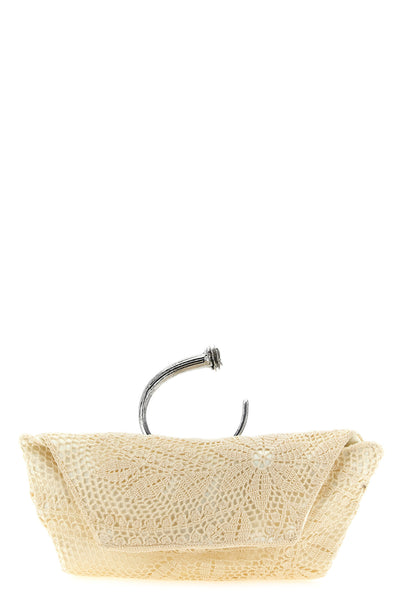 magda butrym clutch sets a new standard of craftsmanship through a complex croch