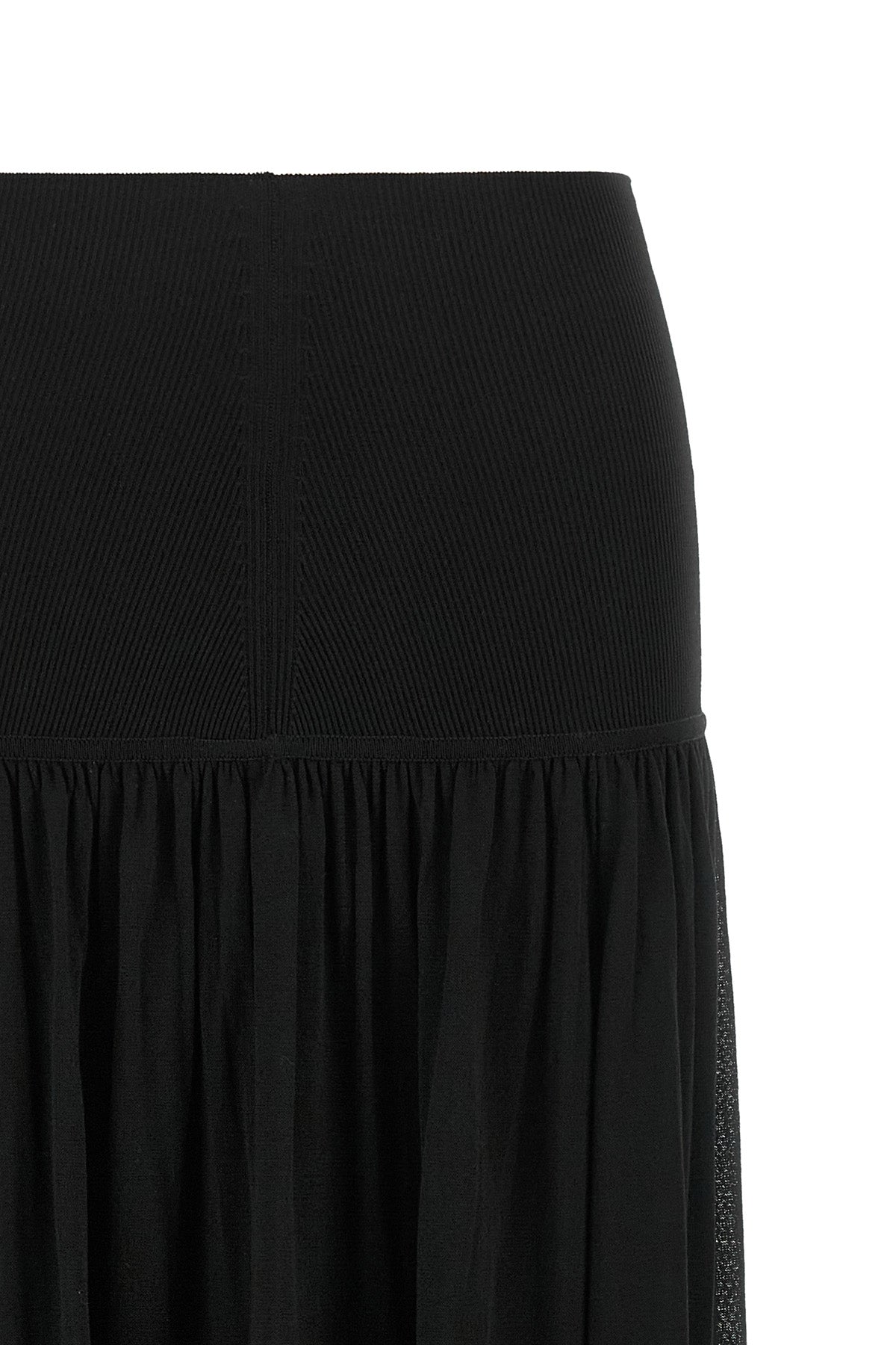 the zimmermann valiant long skirt defines a fluid silhouette through a play of