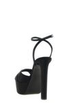 the le silla odette sandals in fine black satin define a sculptural and imposi