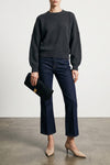 the khaite margaux sweater defines the codes of contemporary knitwear through