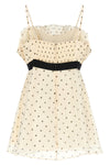 the zimmermann top defines a romantic silhouette through meticulous sartorial co