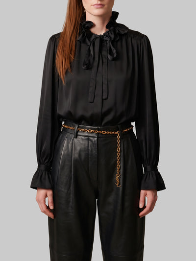 black ruffled shirt