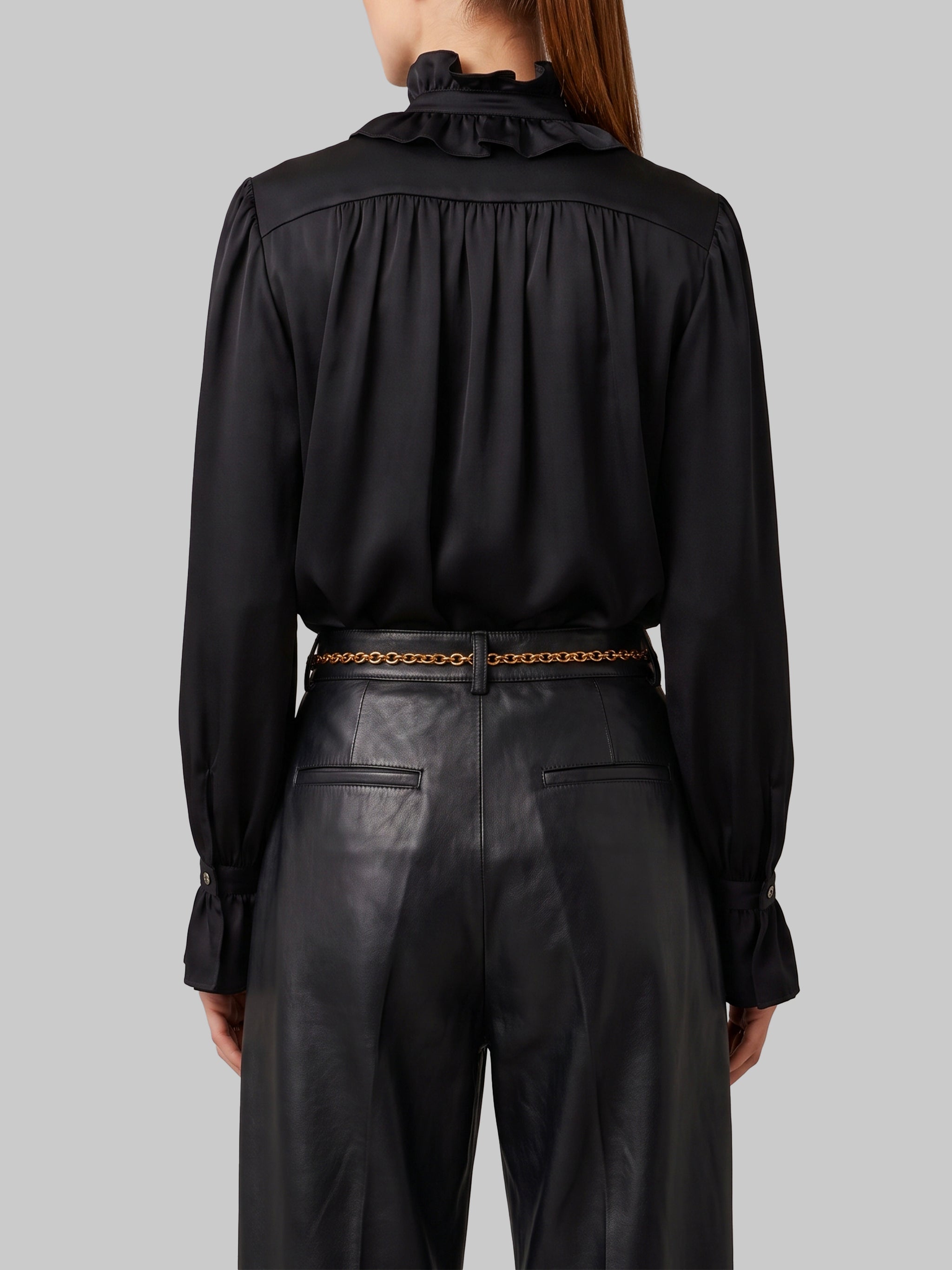 black ruffled shirt