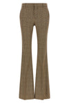 saint laurent flared trousers redefine classic tailoring through a silhouette in