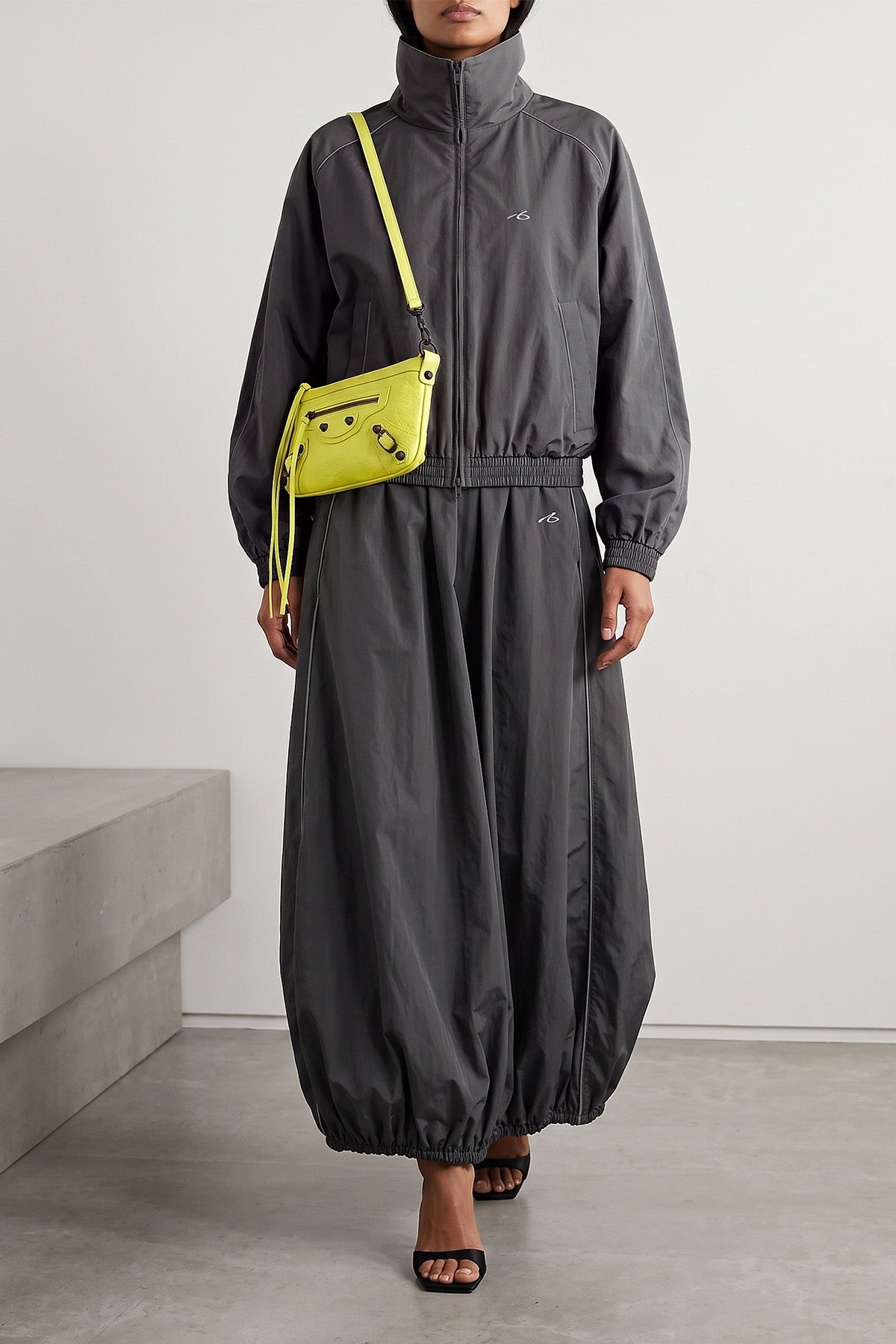 the balenciaga sweatshirt redefines the codes of sportswear through sculptural v