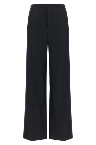 gucci tailored trousers redefine everyday elegance through a loose