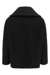 the balenciaga black short caban redefines classic proportions through a rigorou
