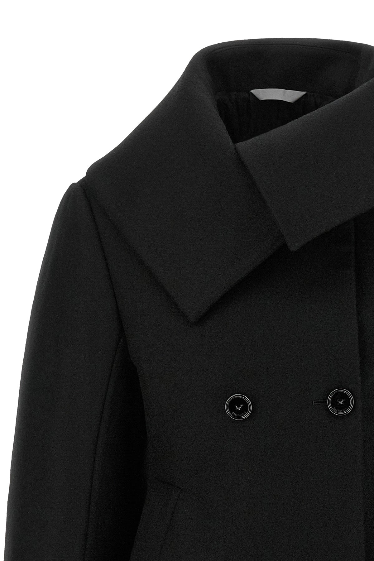 the balenciaga black short caban redefines classic proportions through a rigorou
