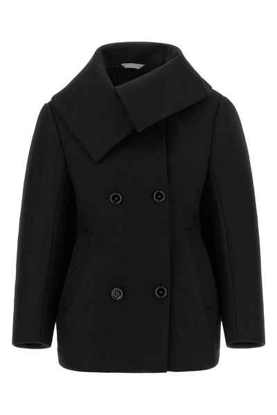 the balenciaga black short caban redefines classic proportions through a rigorou