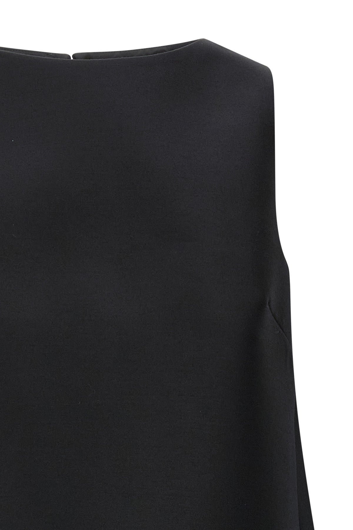 the flared balenciaga dress defines an essential silhouette through rigorous geo