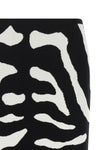 the moschino midi skirt defines a bold aesthetic through a tight and precise sil