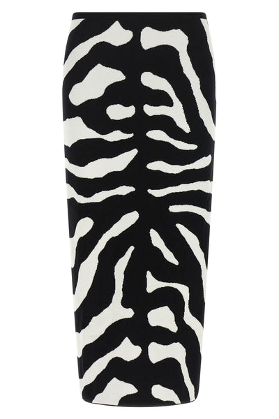 the moschino midi skirt defines a bold aesthetic through a tight and precise sil