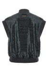 the peserico vest redefines the codes of clothing in layers through a sleeveless