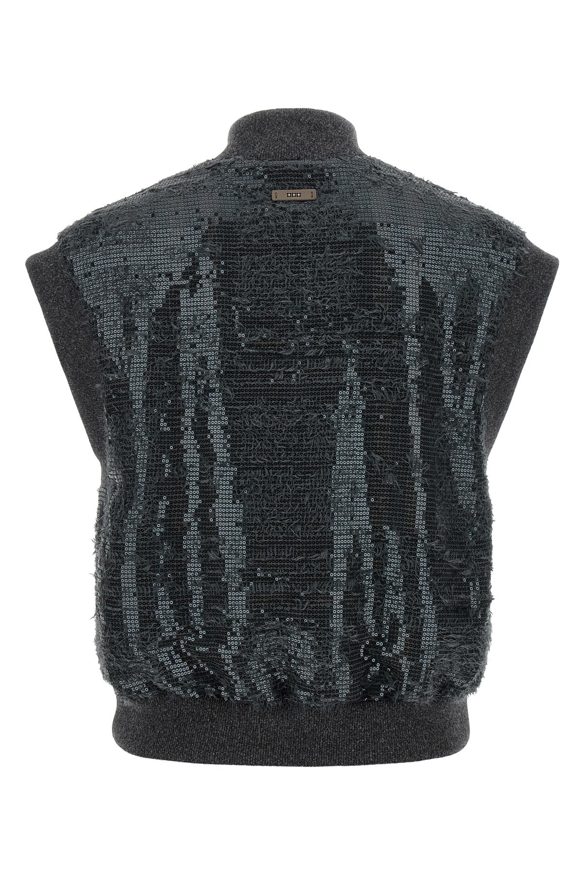 the peserico vest redefines the codes of clothing in layers through a sleeveless