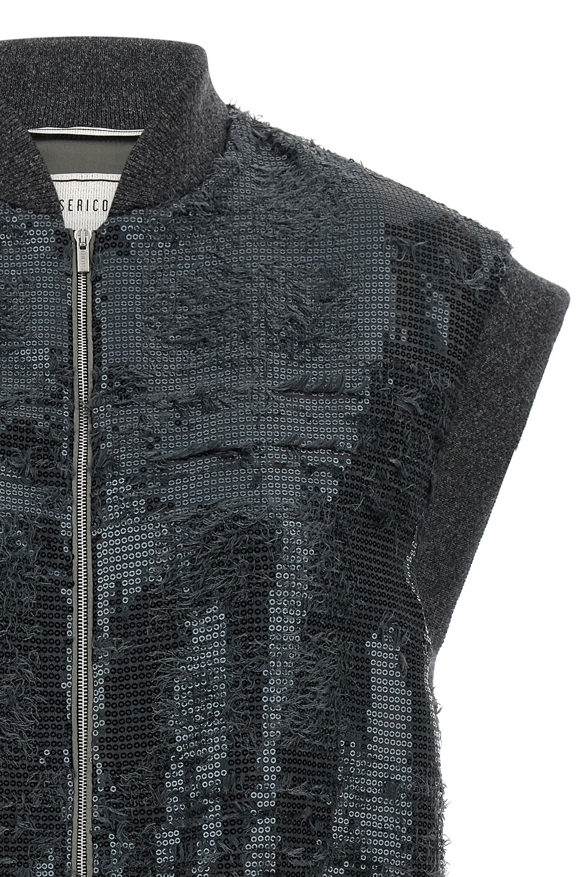 the peserico vest redefines the codes of clothing in layers through a sleeveless