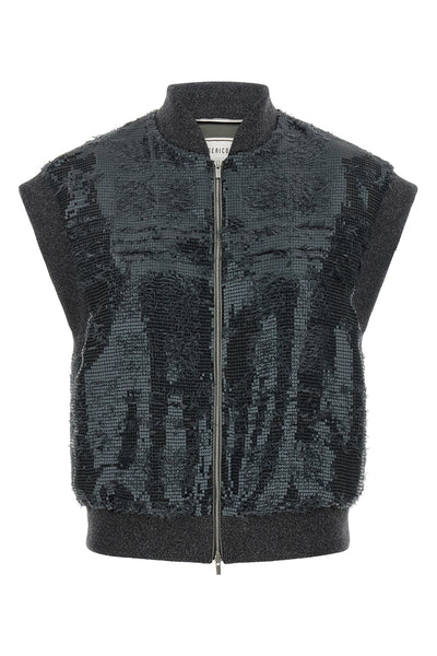 the peserico vest redefines the codes of clothing in layers through a sleeveless