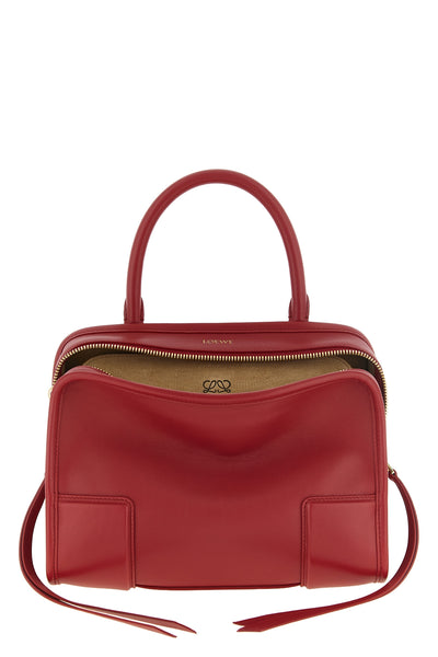 the small loewe amazona 180 handbag defines a rectangular silhouette structure