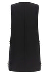 moschinos mini dress redefines the trapezoid silhouette through a sartorial con
