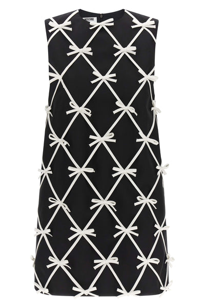 moschinos mini dress redefines the trapezoid silhouette through a sartorial con