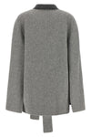 the alberta ferretti cape cardigan redefines the volumes of the outerwear throug