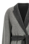 the alberta ferretti cape cardigan redefines the volumes of the outerwear throug