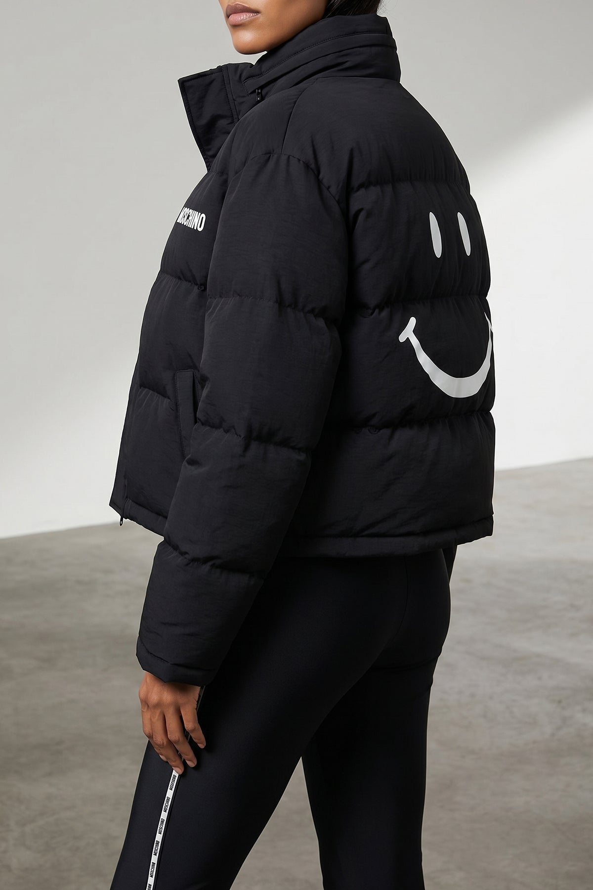 the moschino x smiley bomber jacket redefines the volumes of outerwear through a