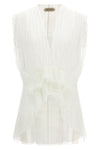 the alberta ferretti tulle top stands out for its ethereal and asymmetrical silh