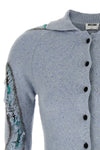 the moschino distressed argyle cardigan in mélange blue redefines classic knit
