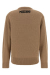 the moschino jersey redefines luxury knitwear through an ironic and sophisticate