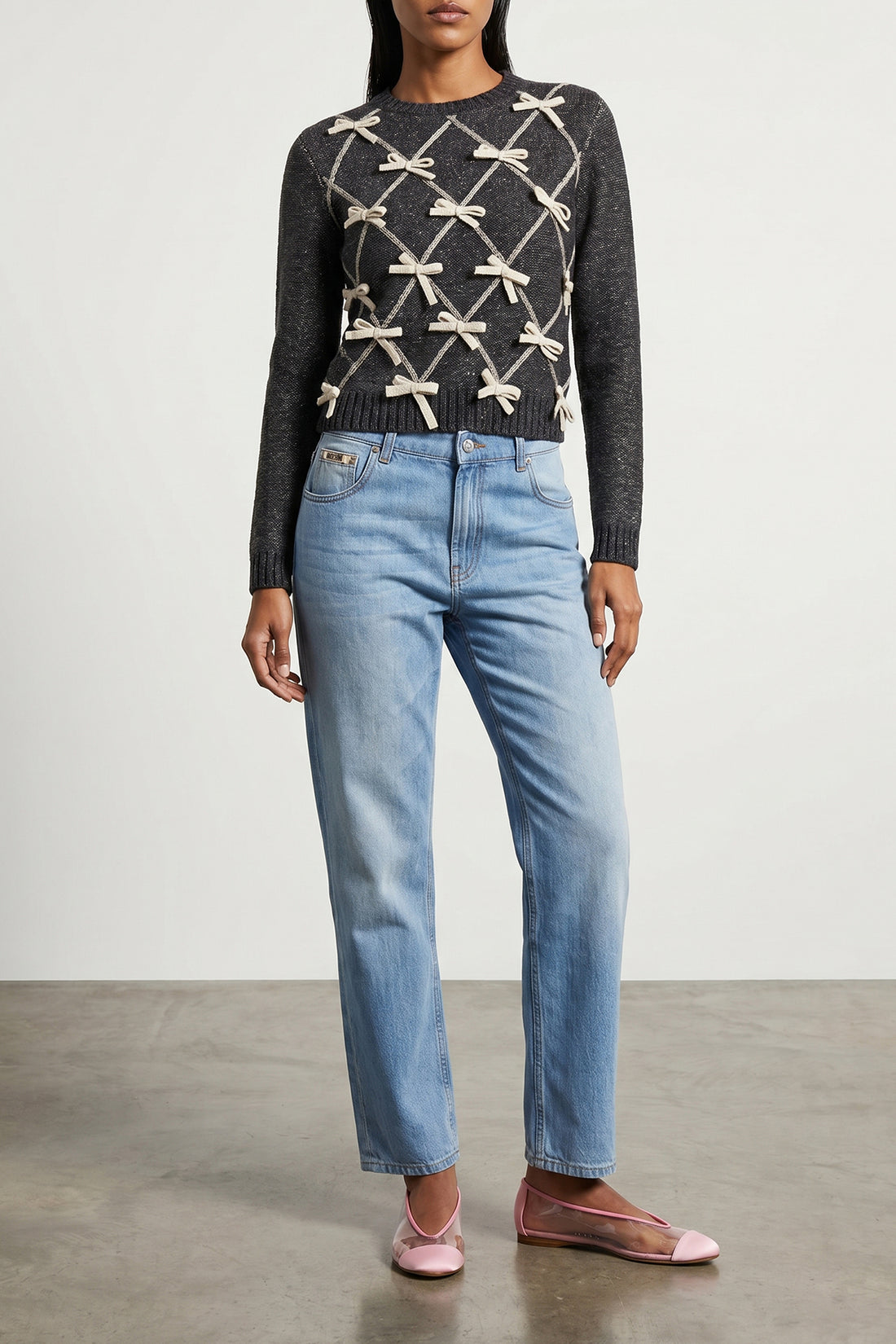 MOSCHINO 38 moschinos sweater redefines classic knitwear through an elaborate contrast work