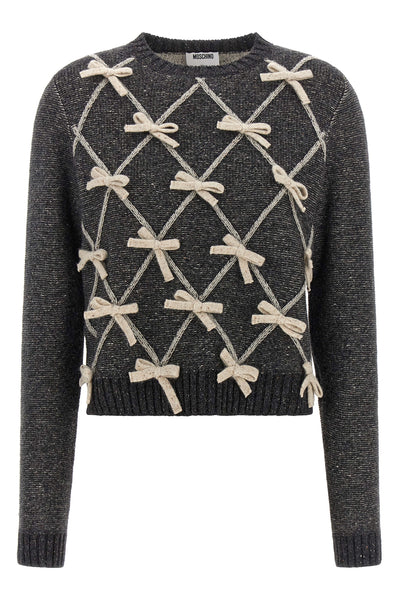 moschinos sweater redefines classic knitwear through an elaborate contrast work