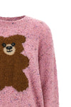 the moschino teddy bear jersey stands out for a complex bouclé workmanship that