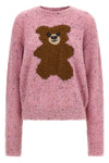 the moschino teddy bear jersey stands out for a complex bouclé workmanship that