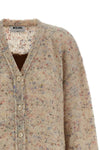 the moschino cardigan redefines contemporary knitwear through a sophisticated bo