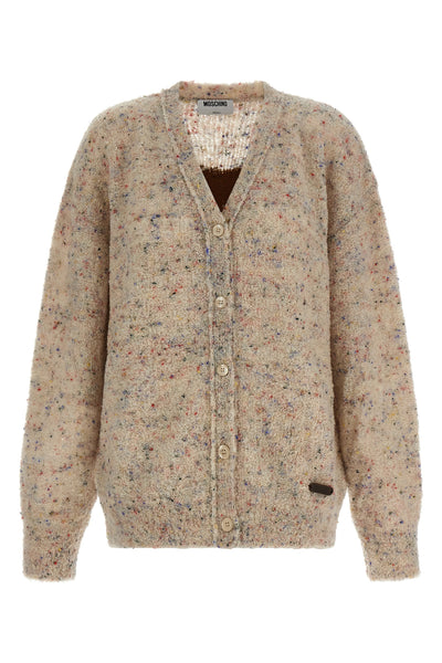 the moschino cardigan redefines contemporary knitwear through a sophisticated bo