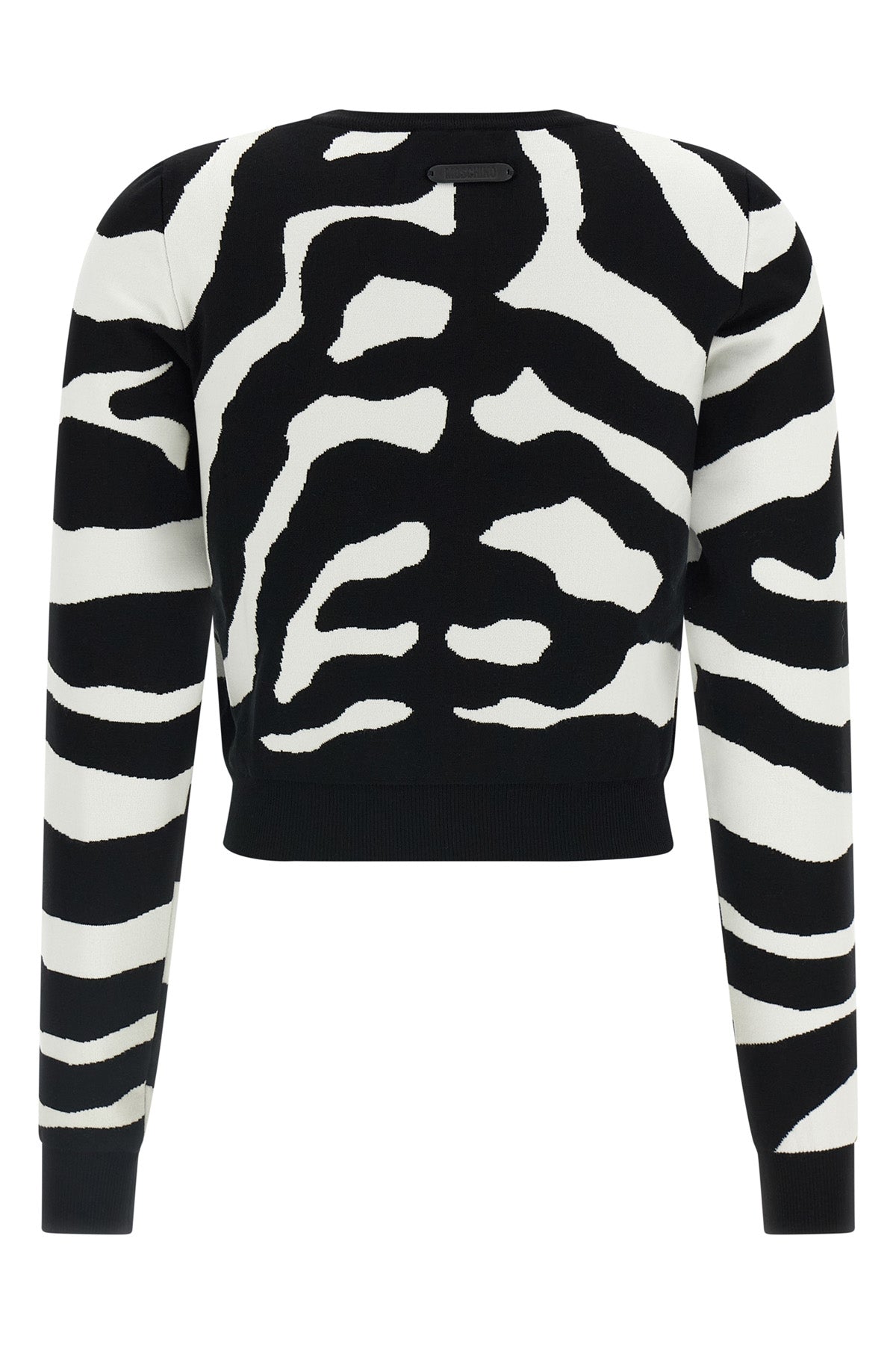the moschino jersey redefines contemporary knitwear through a bold visual narrat
