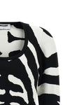 the moschino jersey redefines contemporary knitwear through a bold visual narrat