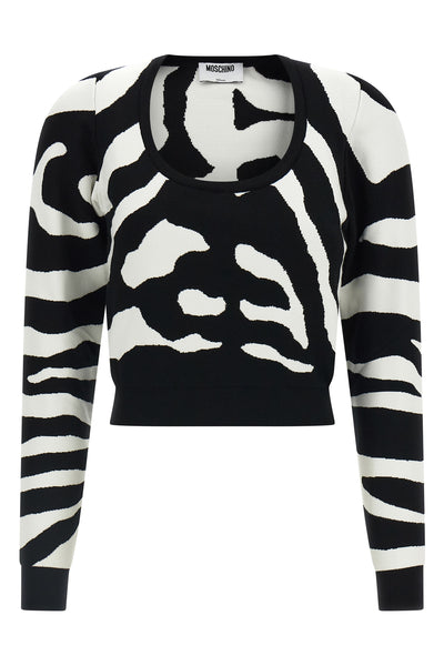 the moschino jersey redefines contemporary knitwear through a bold visual narrat