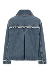 the denim jacket ganni redefines the codes of casual dress through a structured