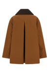 the ganni jacket reinterprets the workwear aesthetic through sartorial volumes a