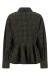 the ganni shirt redefines sartorial volumes through a structured silhouette