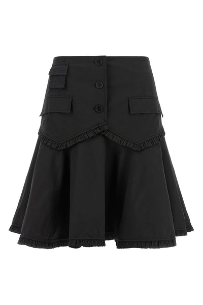 the ganni midi skirt redefines volumes through a structured silhouette at the wa