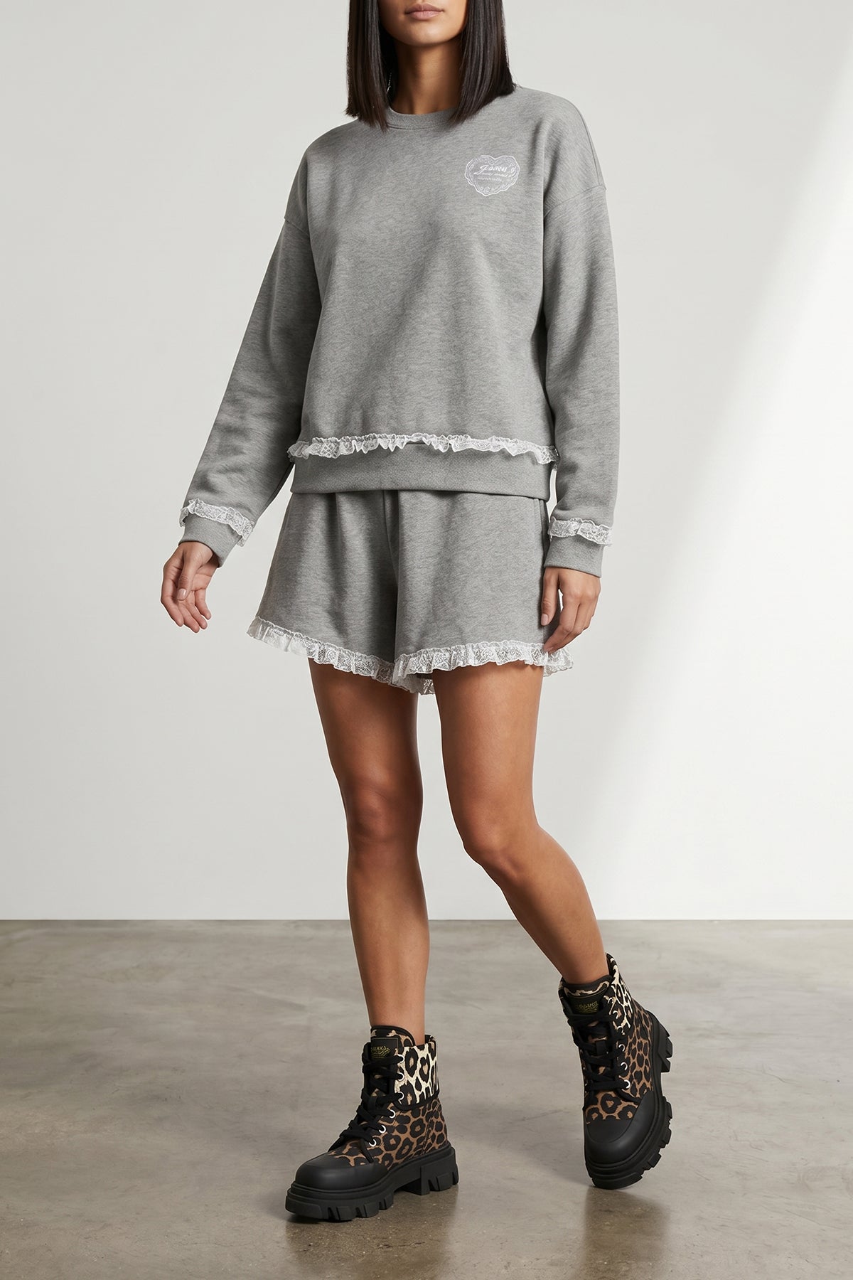 the ganni isoli shorts redefine casual style through a precise balance of text