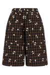 gannis check flower bermuda shorts present a masterful balance between sartor