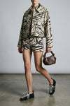 zebra graphic print laminated fabric jacket