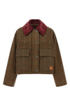 the ganni short jacket redefines the proportions of the outerwear through a boxy
