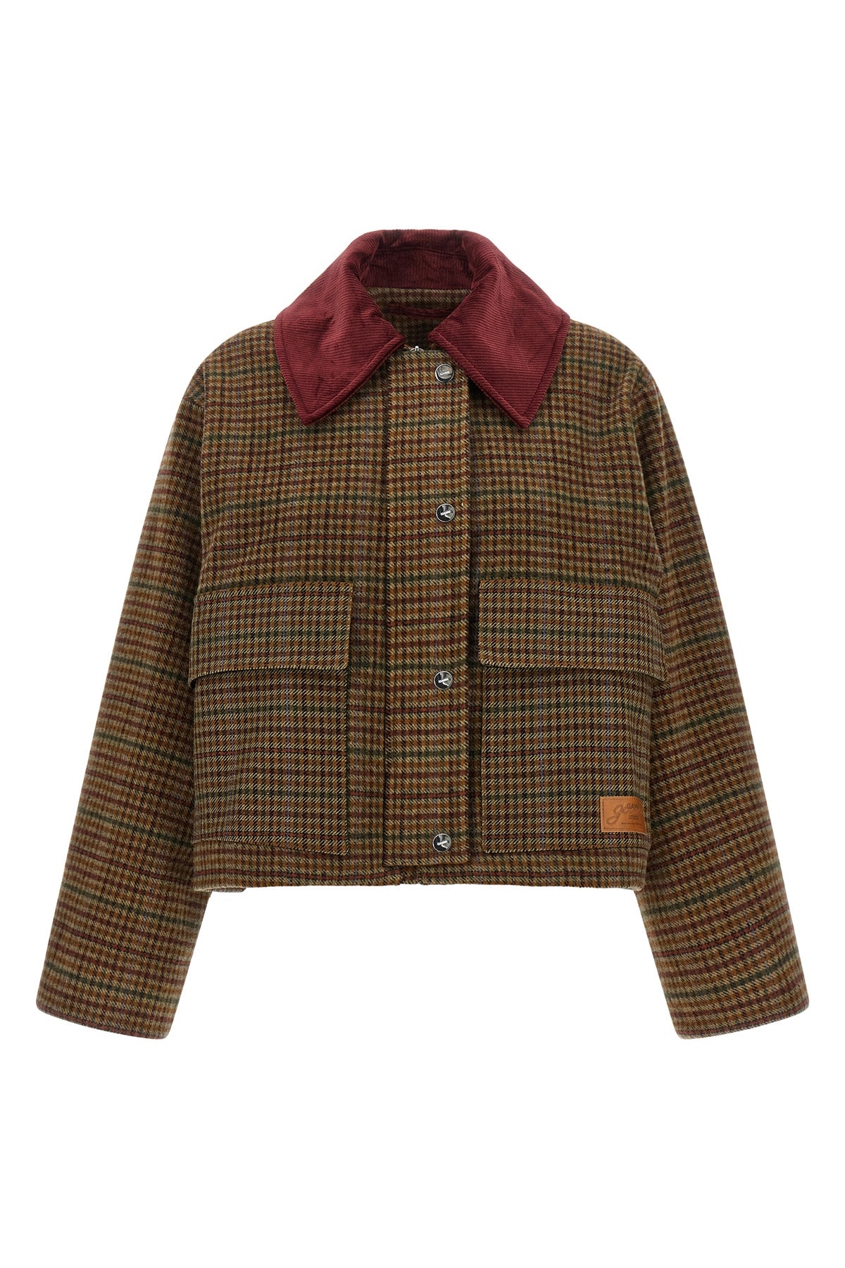 the ganni short jacket redefines the proportions of the outerwear through a boxy