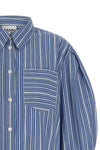 the ganni striped shirt redefines the codes of everyday tailoring through unexpe